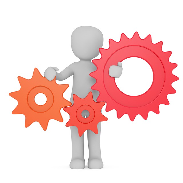 This is a graphic of a round character holding 3 cogs together.